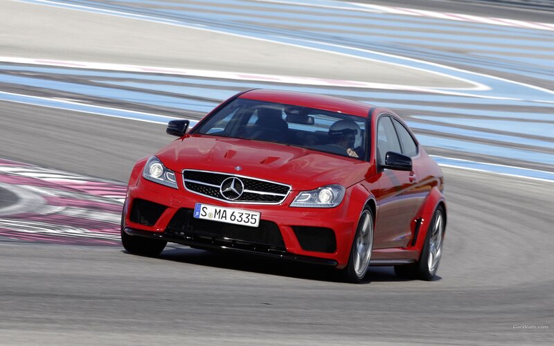 Red Mercedes-Benz C63 AMG on track