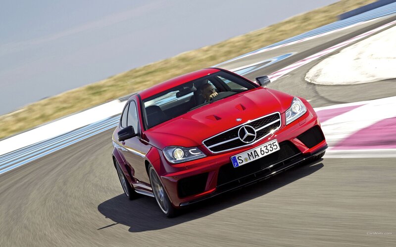 Red Mercedes-Benz C63 AMG on track