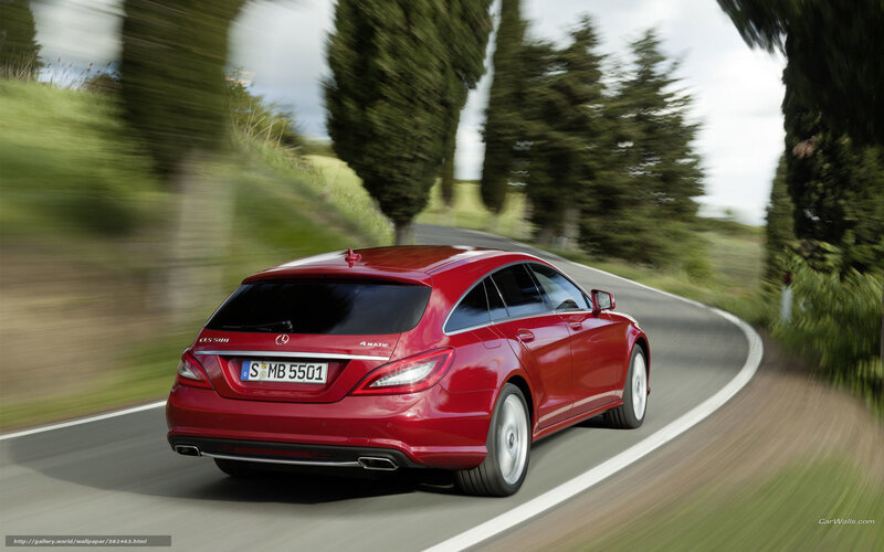 Red Mercedes-Benz CLS driving on road