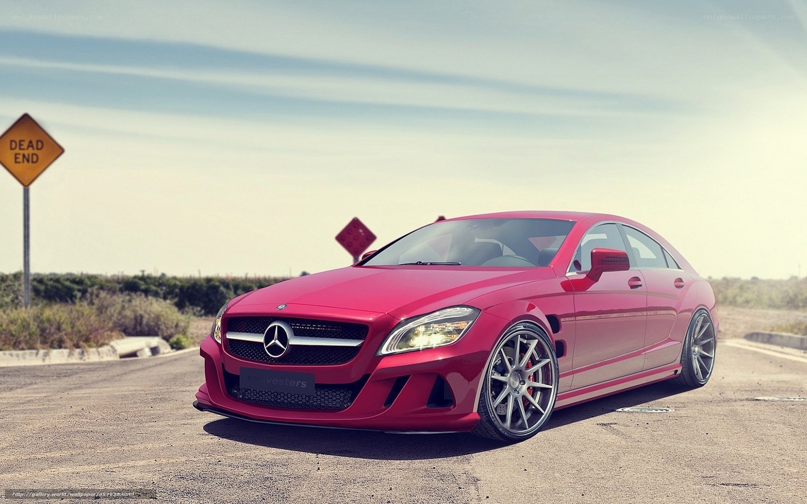 Red Mercedes-Benz CLS parked on road