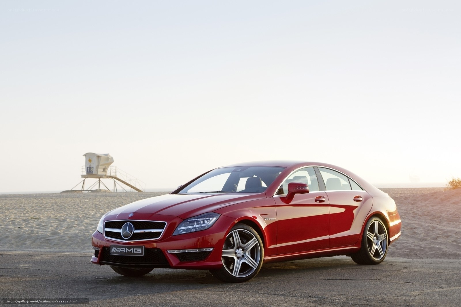 Red Mercedes-Benz CLS63 AMG on beach