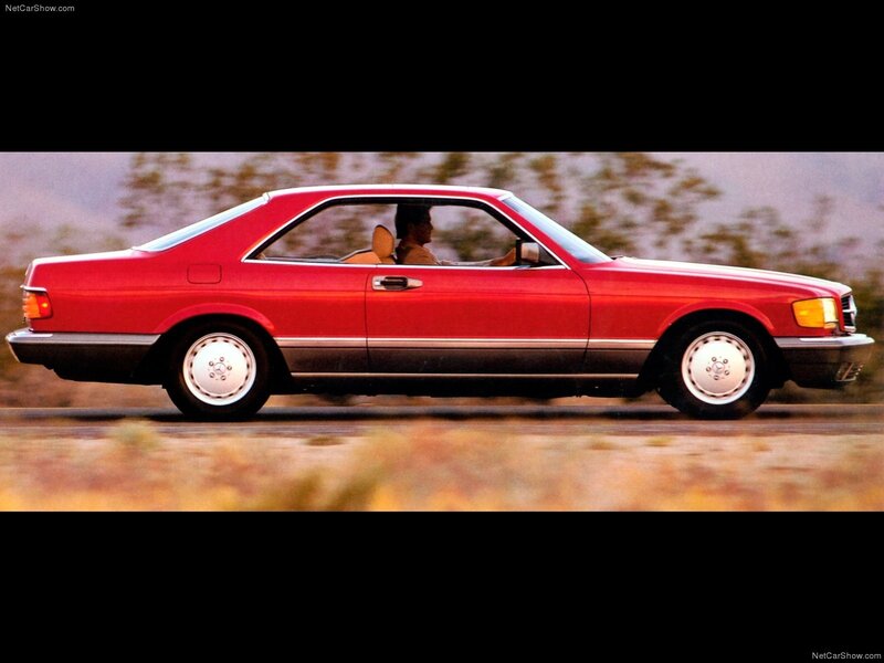 Red Mercedes-Benz coupe in motion