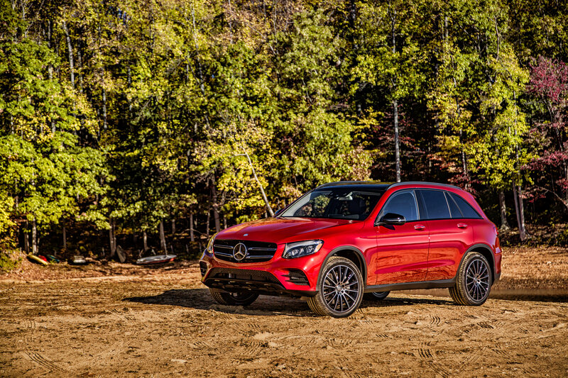Red Mercedes-Benz GLC in forest