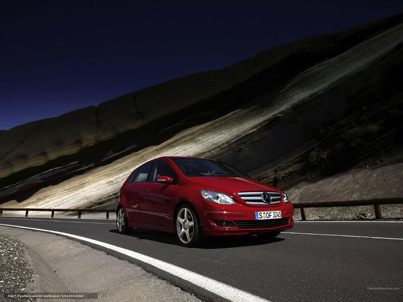 Red Mercedes-Benz on mountain road