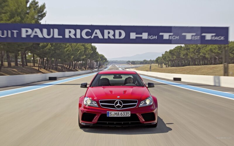 Red Mercedes-Benz on racetrack