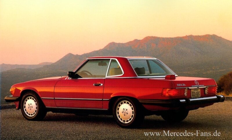 Red Mercedes-Benz SL parked at sunset
