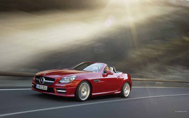 Red Mercedes-Benz SLK driving