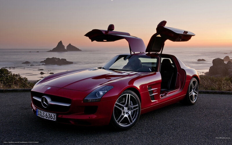 Red Mercedes-Benz SLS AMG by the coast