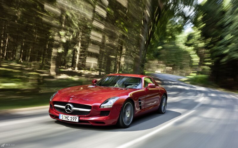 Red Mercedes-Benz SLS AMG driving