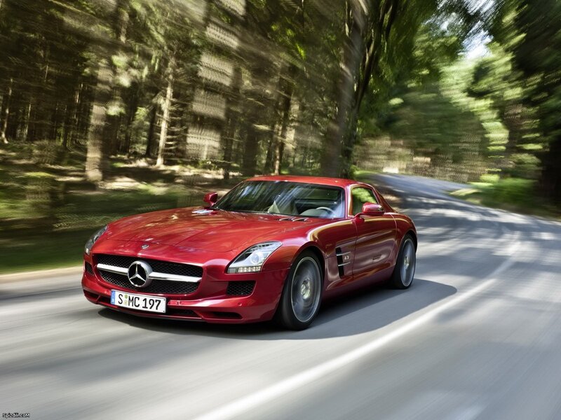 Red Mercedes-Benz SLS AMG driving