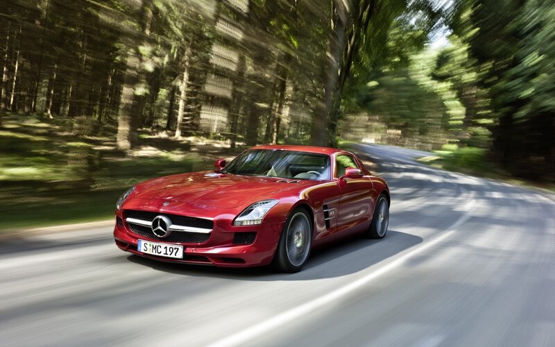 Red Mercedes-Benz SLS AMG driving