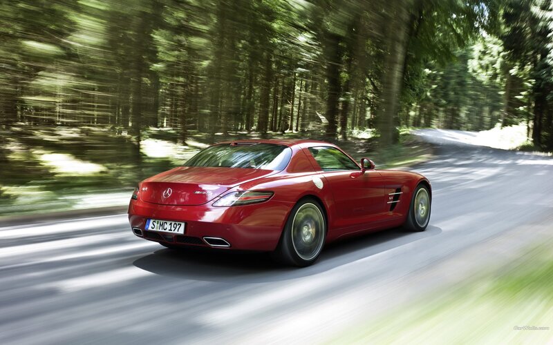 red mercedes-benz sls amg driving