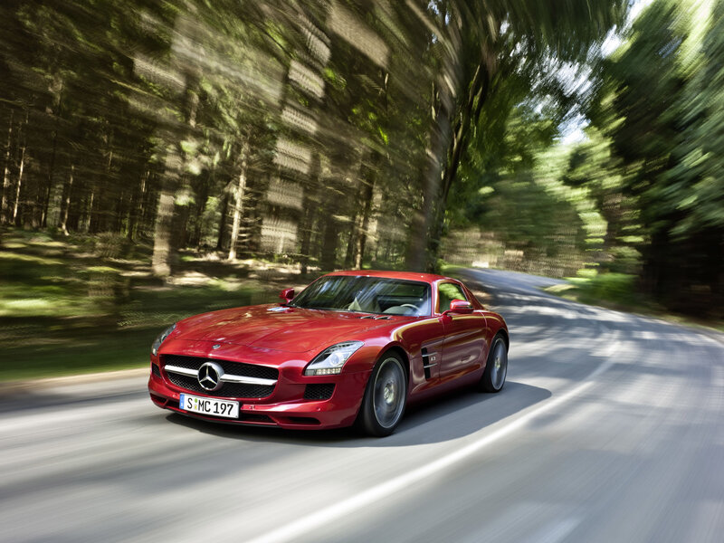 Red Mercedes-Benz SLS AMG driving