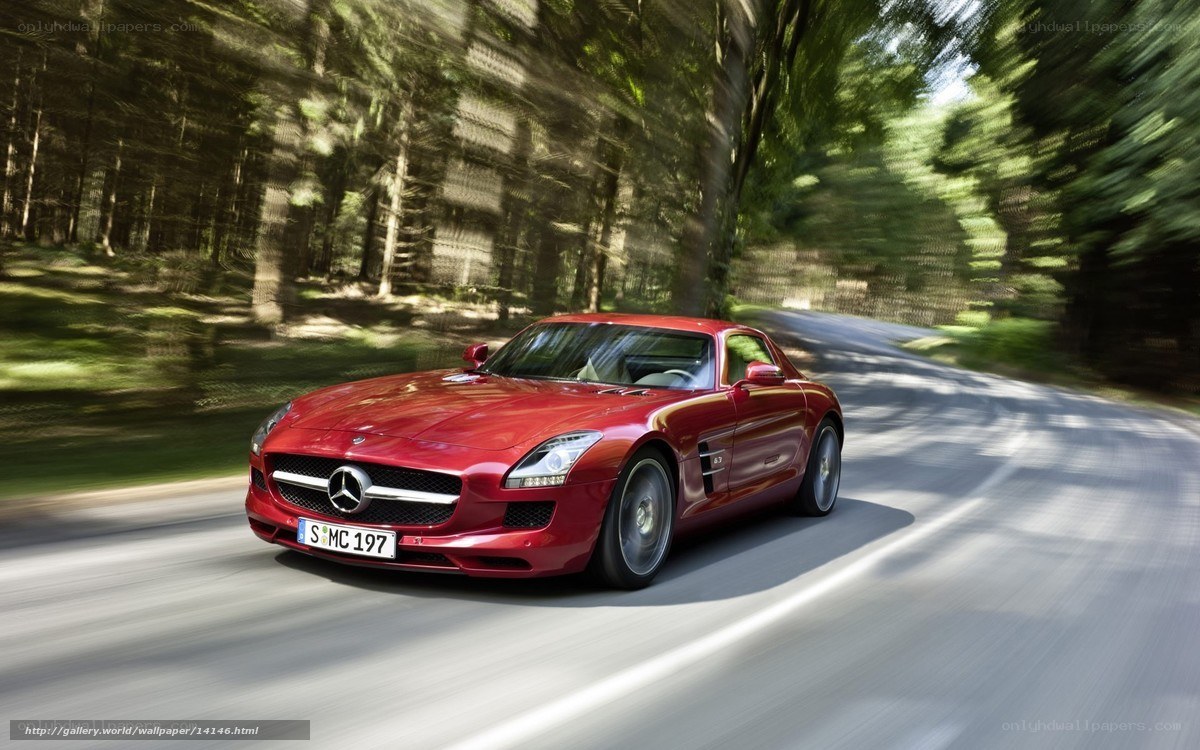 Red Mercedes-Benz SLS AMG on a forest road