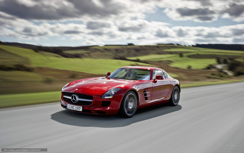 Red Mercedes-Benz SLS AMG on country road