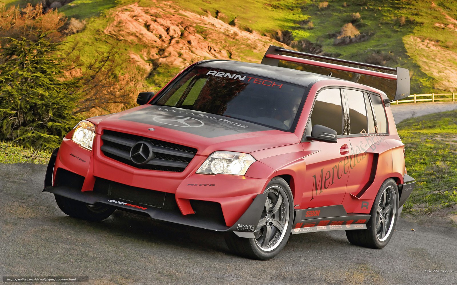 red mercedes-benz suv on road