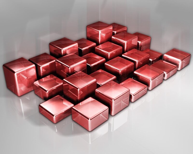 Red metallic cubes on white surface