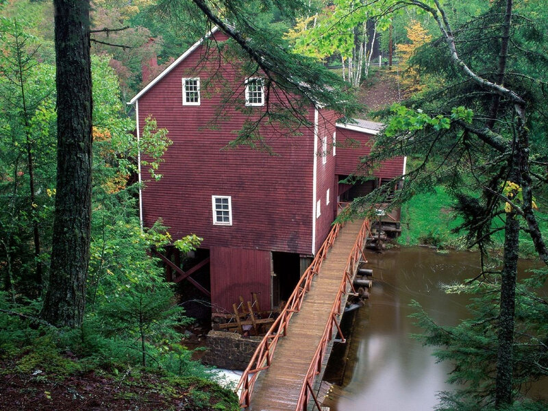 Red mill in forest setting