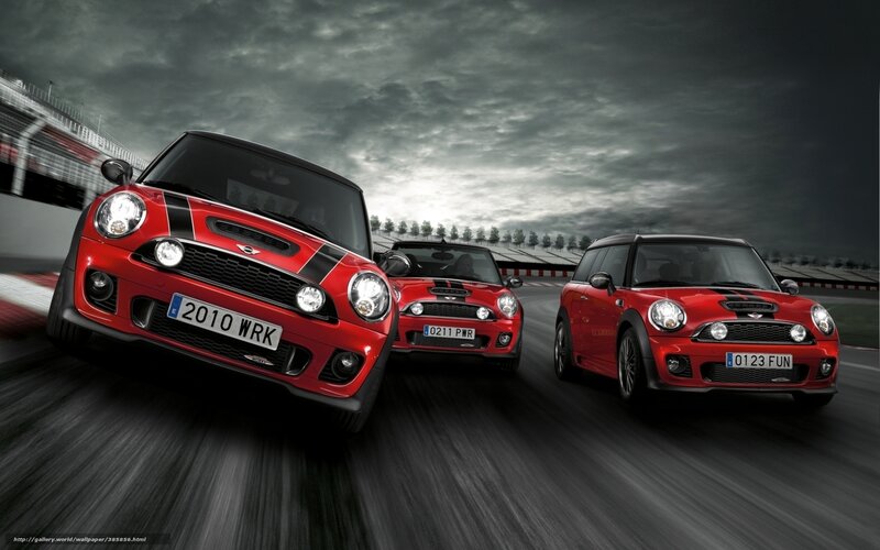 Red MINI cars racing on track