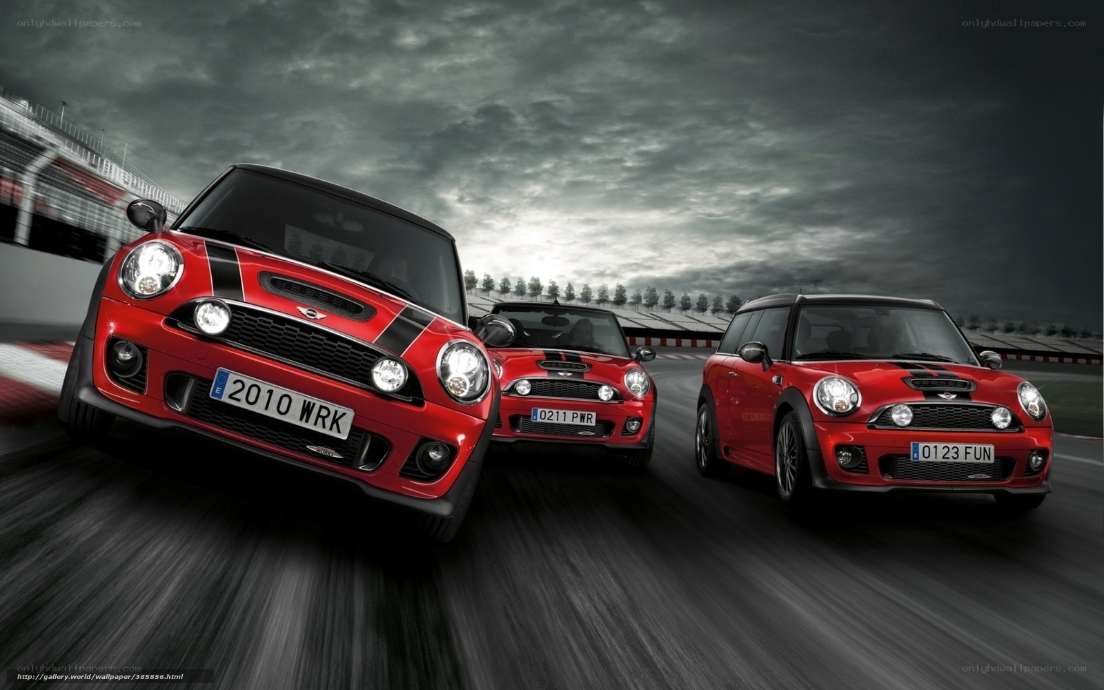 Red MINI cars racing on track