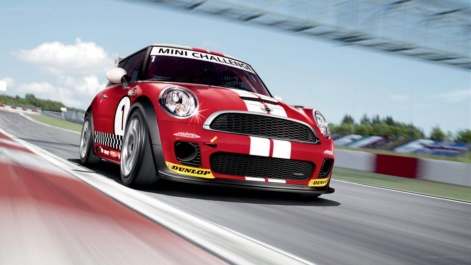 Red MINI Challenge race car on track