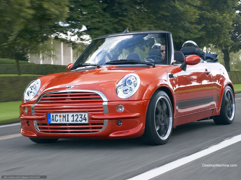 Red MINI convertible in motion