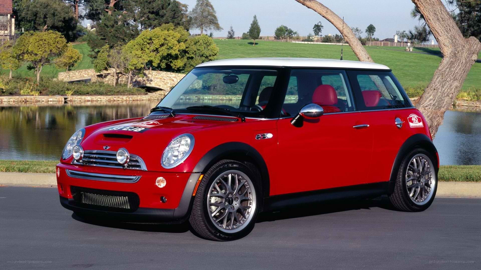Red Mini Cooper by a lake