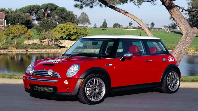 Red MINI Cooper by a lake