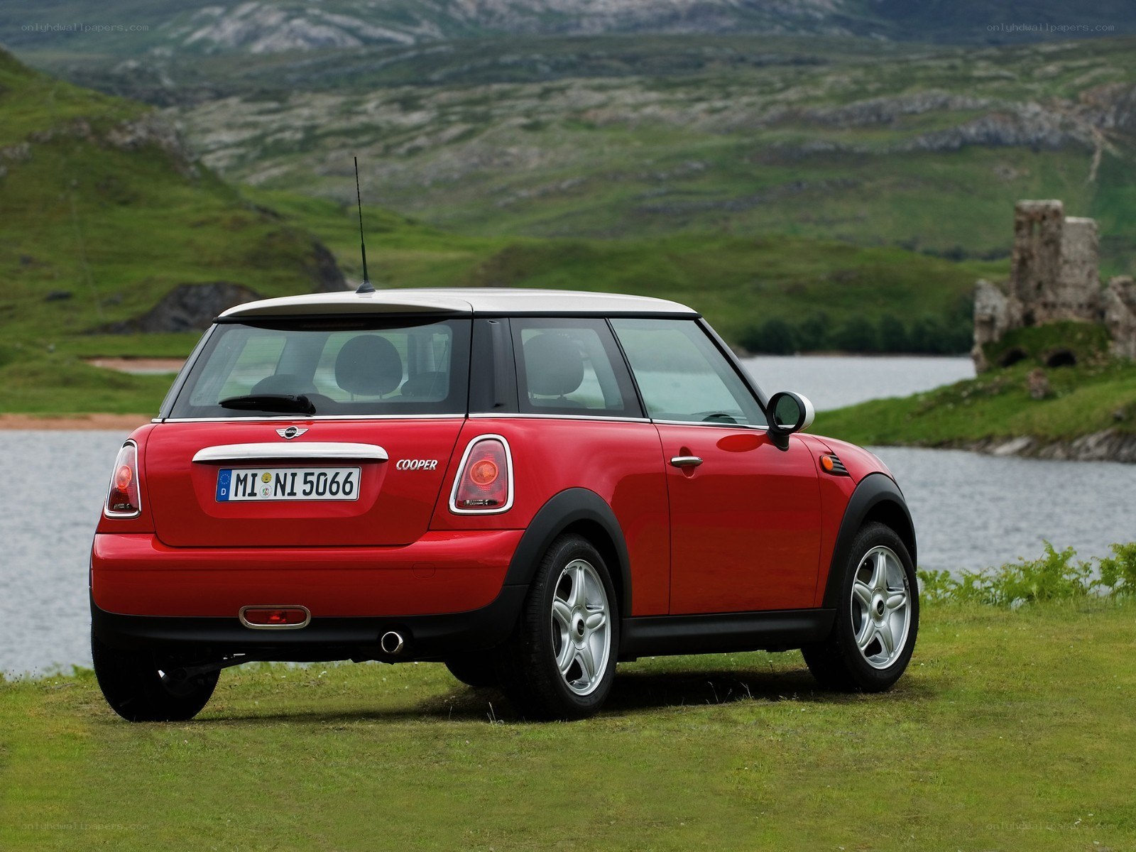 Red Mini Cooper by a lake