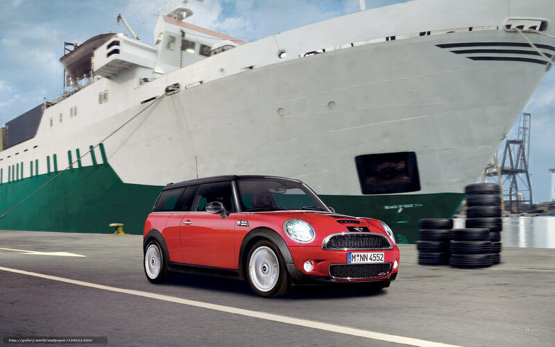 Red Mini Cooper by a ship