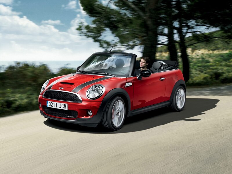 Red MINI Cooper convertible driving
