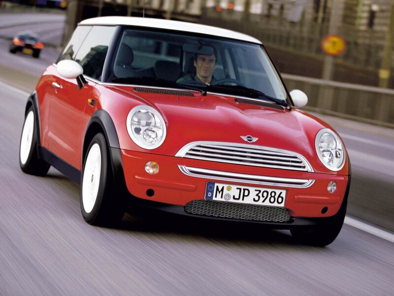 Red Mini Cooper in motion