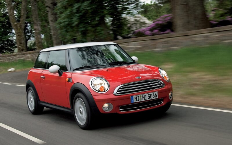 Red Mini Cooper in motion