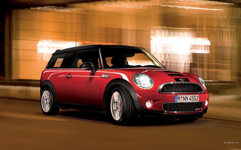 red mini cooper in motion