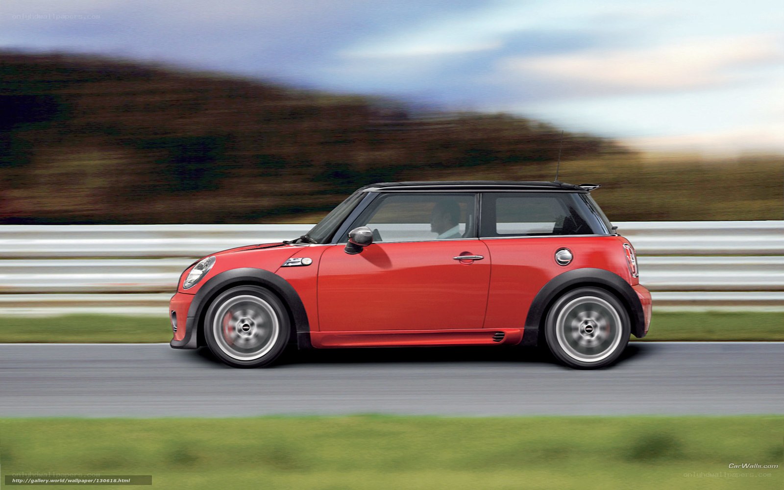 red mini cooper in motion
