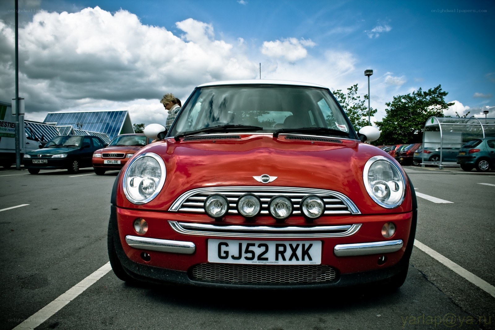 Red Mini Cooper in parking lot