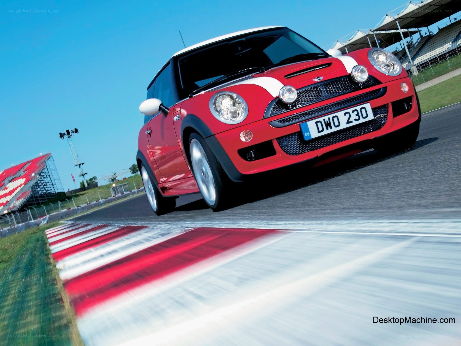 Red Mini Cooper on a racetrack