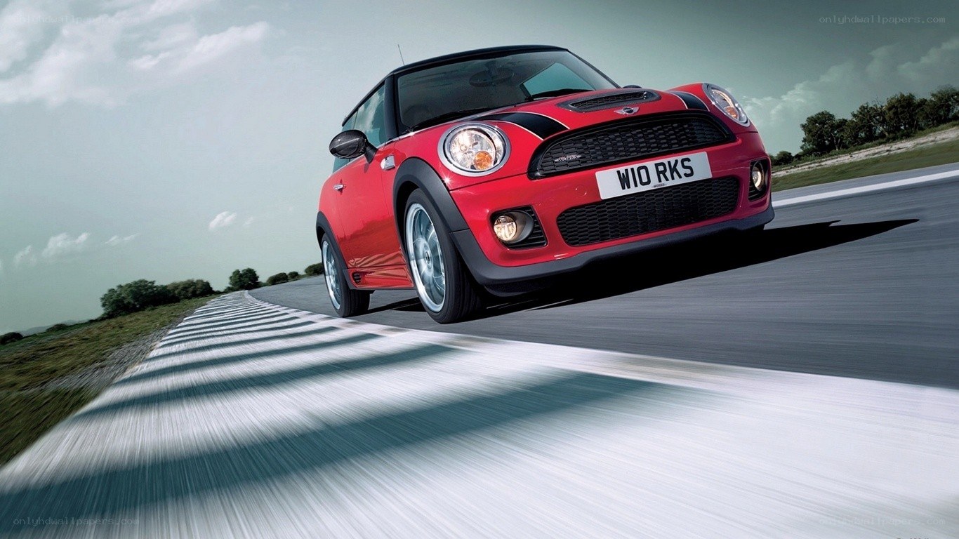 Red MINI Cooper on a racetrack