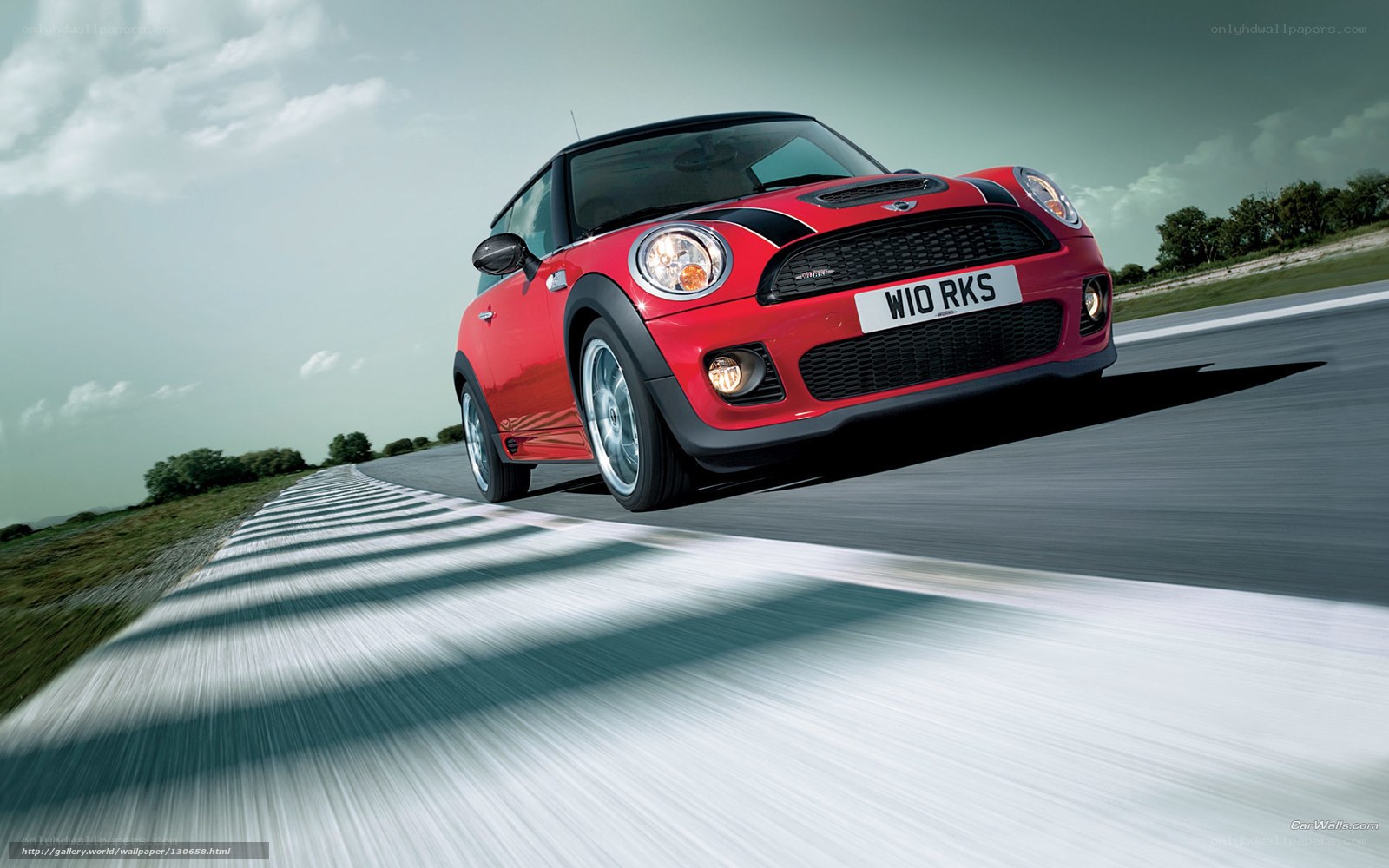 Red Mini Cooper on a racetrack