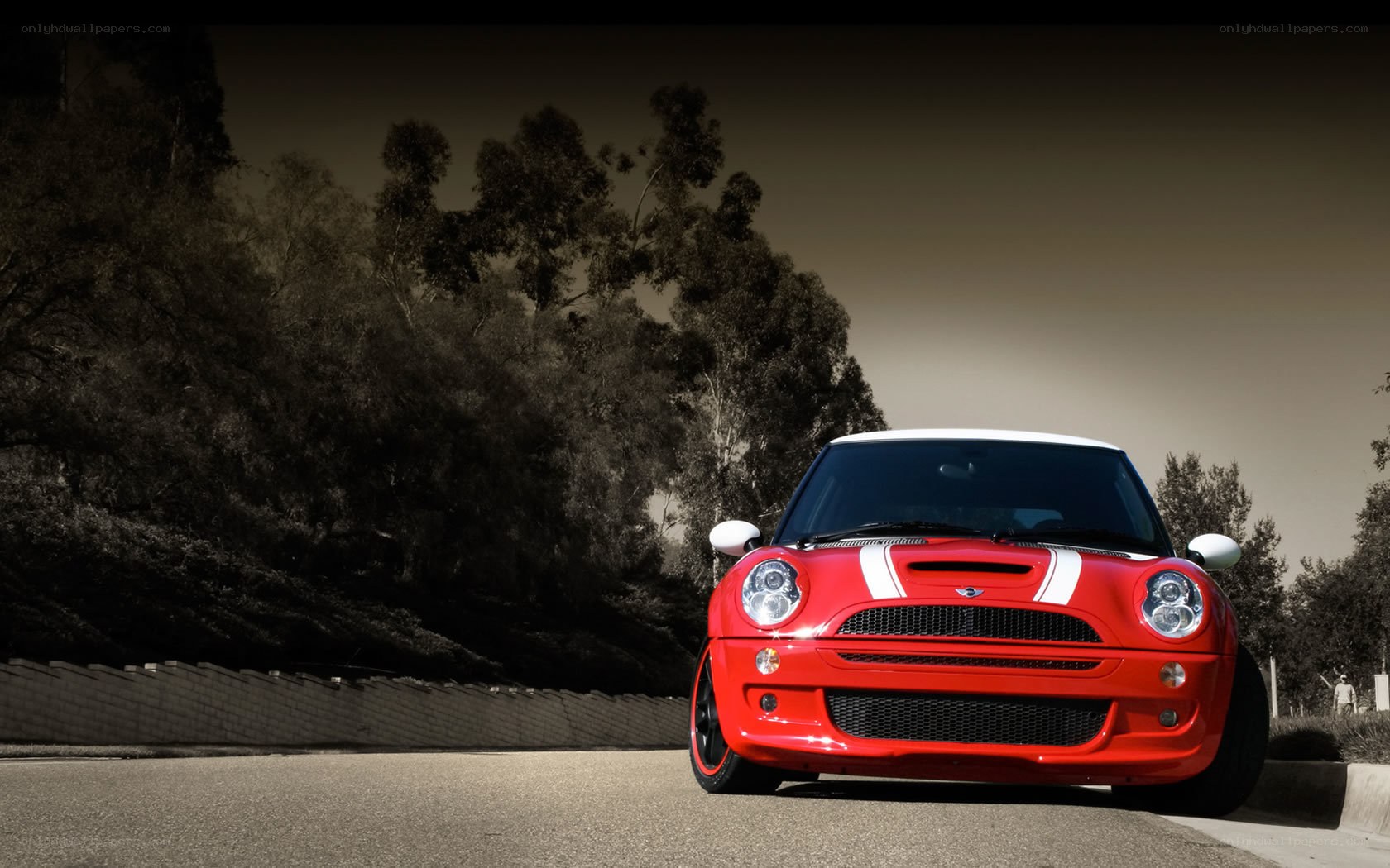 Red MINI Cooper on a road