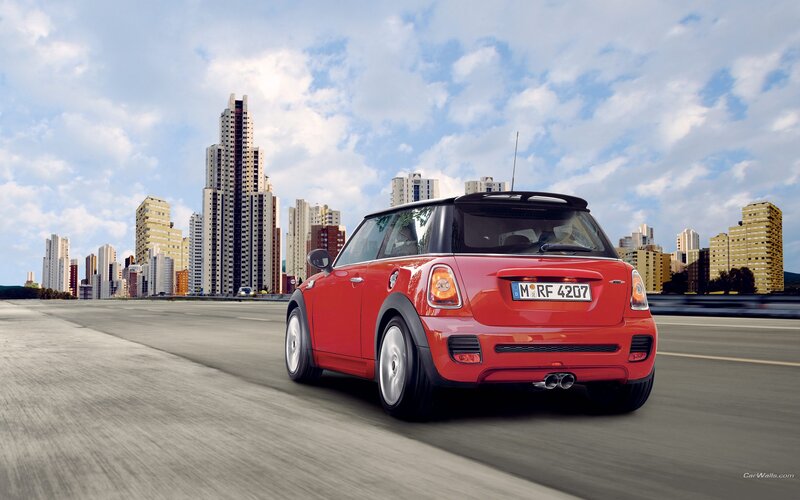Red MINI Cooper on city road