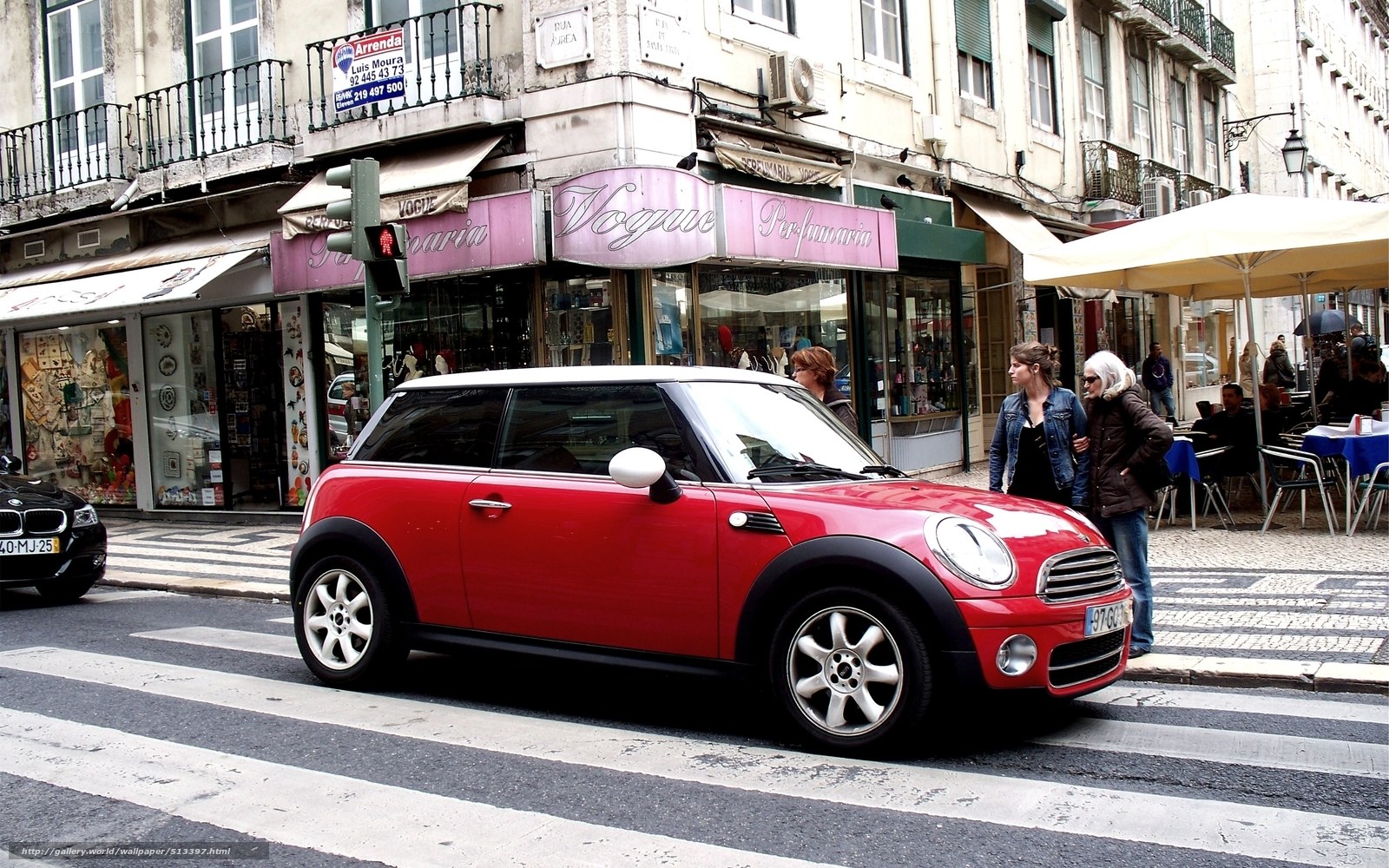 Red Mini Cooper on city street