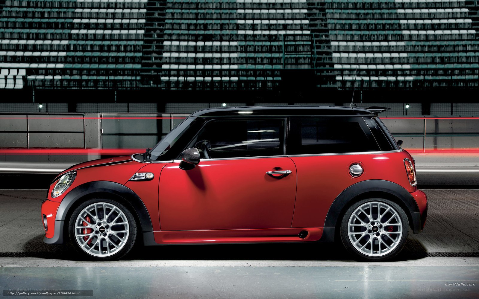 Red MINI Cooper on racetrack