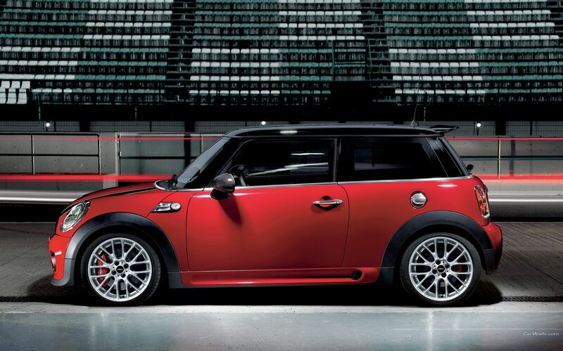 Red MINI Cooper parked at night