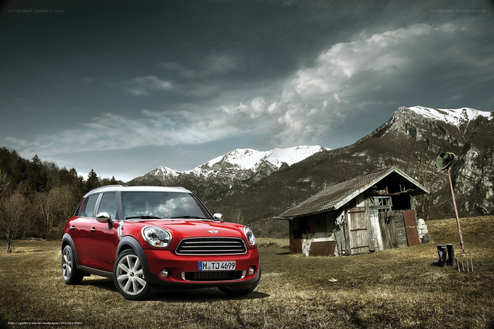 Red Mini Countryman in mountain landscape