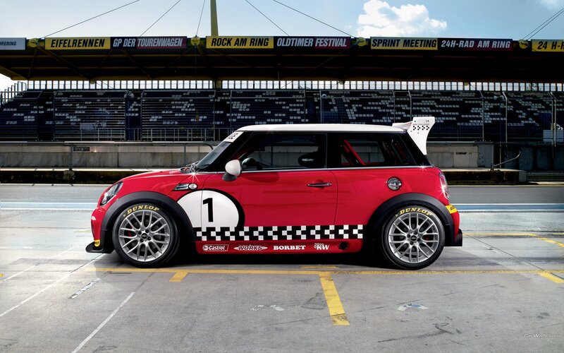Red MINI race car on track