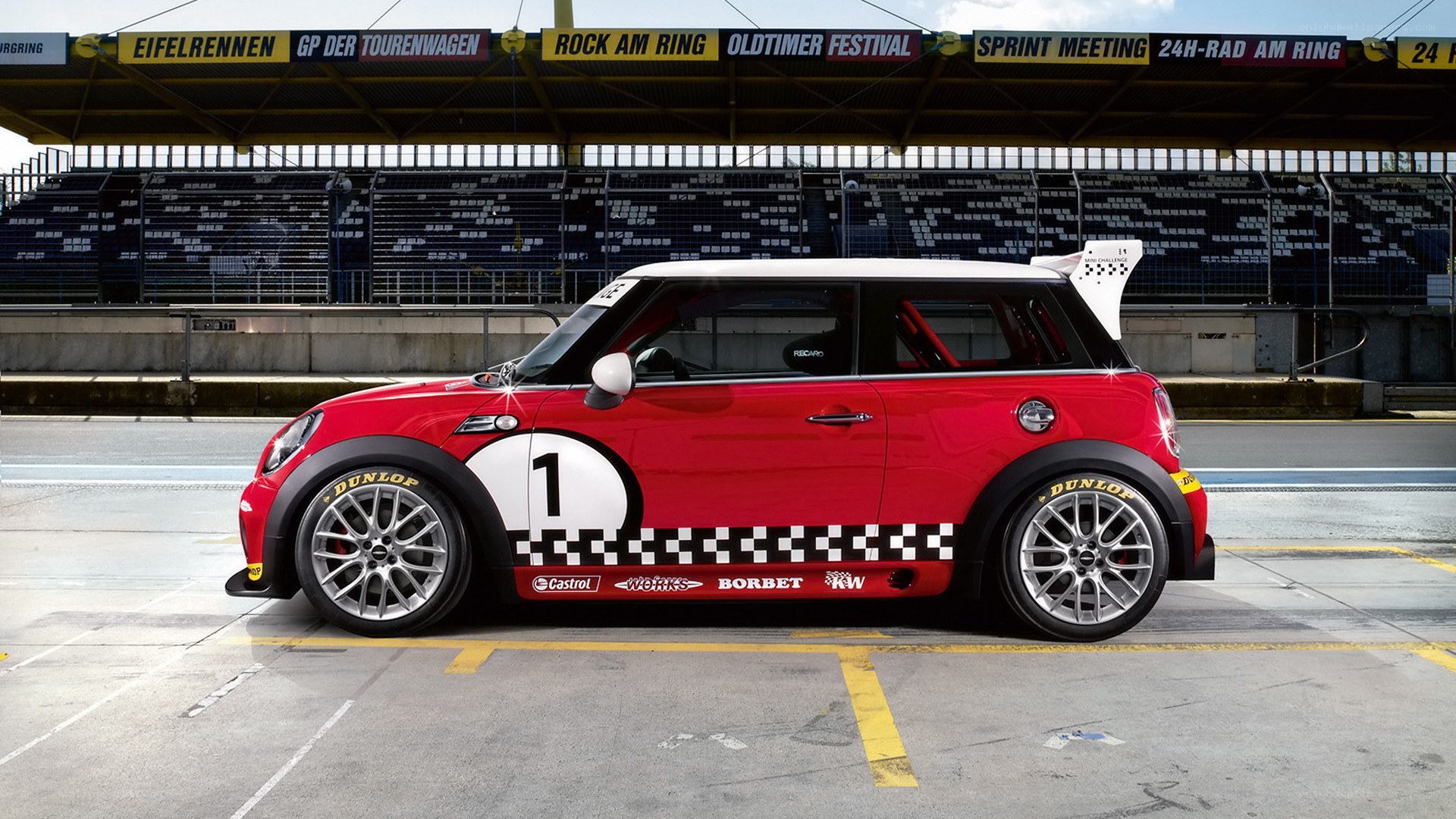 Red MINI race car on track