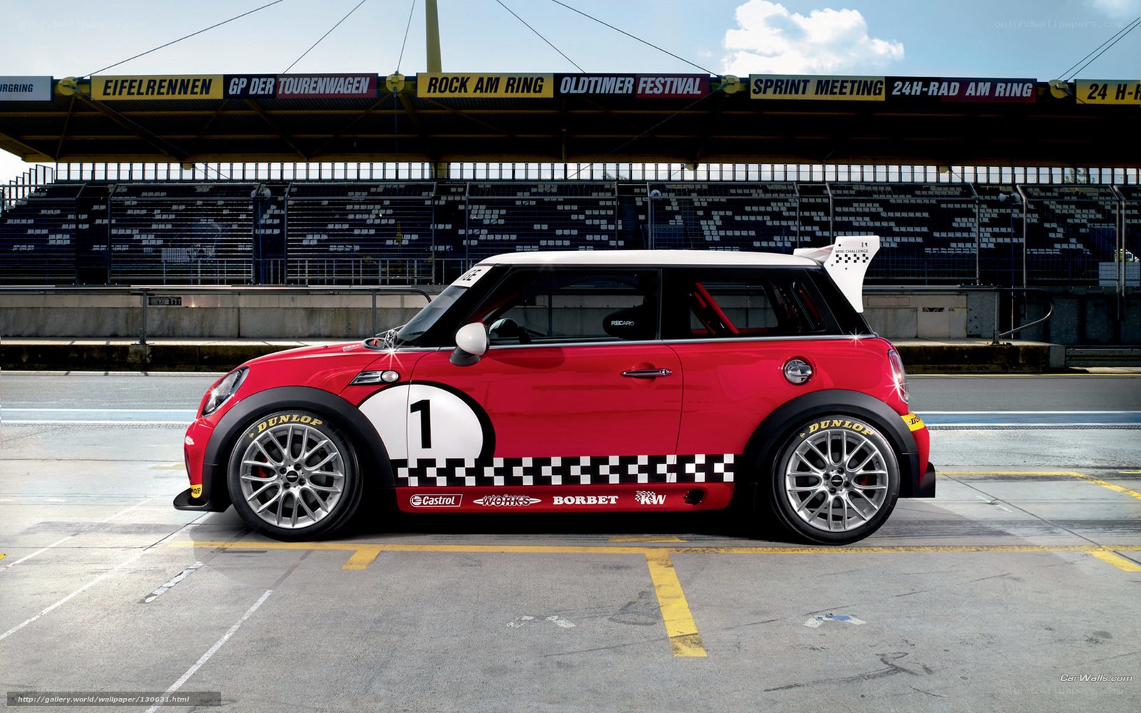 Red Mini race car on track