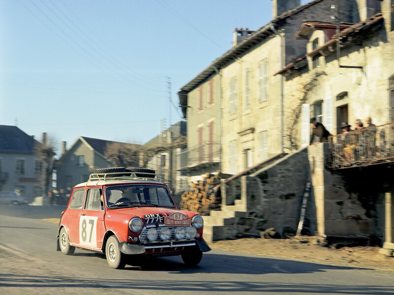 Red Mini rally car on street