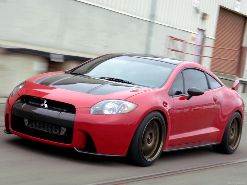 red mitsubishi eclipse in motion
